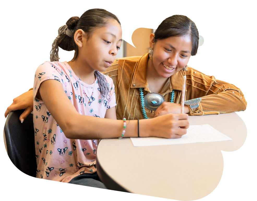 Two elementary students doing a Twig Science hands-on experiment with their teacher